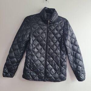 black quilted down jacket zip up‎ gorpcore outdoors neutral minimalist